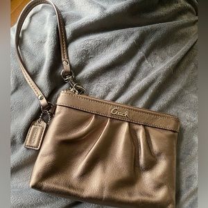 Coach Bronze Metallic Wristlet- like new. 7 x 4.75 in